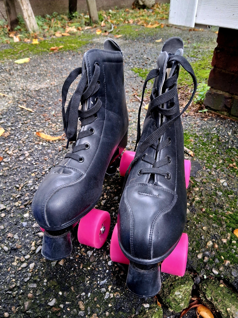 Black Roller Skates with Pink Wheels - Classic Lace-Up Style